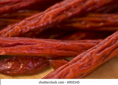 A Delicious Pile Of Pepperoni Sticks.