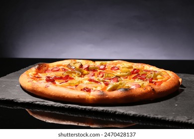 Delicious pizza Diablo on slate board against grey background - Powered by Shutterstock