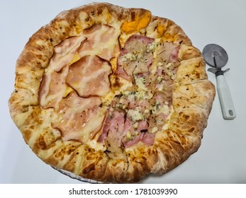 Delicious Pizza With Edge Stuffed With Cheddar Cheese. Turkey Breast Pizza With Curd And Another Half Of Ham, Gorgonzola Cheese And Onion.