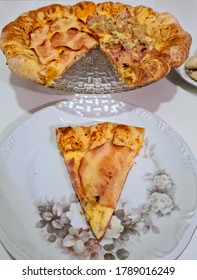 Delicious Pizza With Edge Stuffed With Cheddar Cheese. Turkey Breast Pizza With Curd And Another Half Of Ham, Gorgonzola Cheese And Onion.