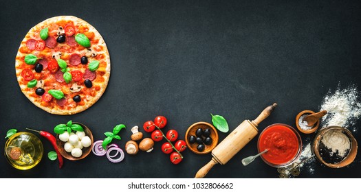 Delicious pizza with ingredients and spices. Top view with copy space on wooden table - Powered by Shutterstock