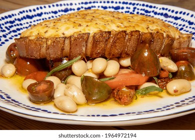 A Delicious Plate Of A Rarebit Pork Chop With Summer Bean Salad 