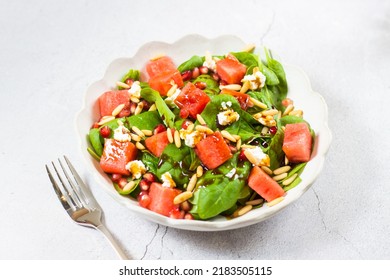 Delicious  Plate Of The Watermelon Salad And Fork On The Table ,white Background