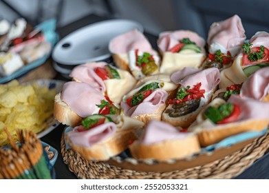 Delicious platter of sandwiches arranged for a casual gathering at home with friends in the afternoon - Powered by Shutterstock