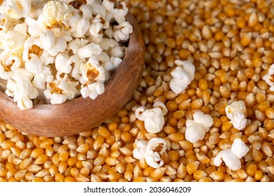 Delicious popcorn and unpopped corn, dried corn