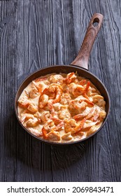 Delicious Prawns Cooked In A Pan With Rich, Creamy Alfredo Sauce With Grated Parmesan Cheese, Garlic And Spices, Vertical View