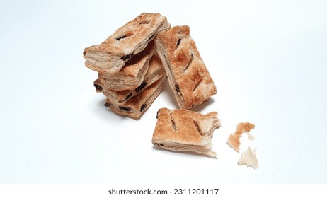 Delicious puff pastry on a white background. - Shutterstock ID 2311201117