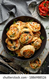 Delicious Puff Pastry Snacks Pinwheels With Salmon, Spinach And Mozzarella Cheese In A Bowl Top View