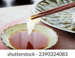 Delicious pufferfish sashimi on a plate