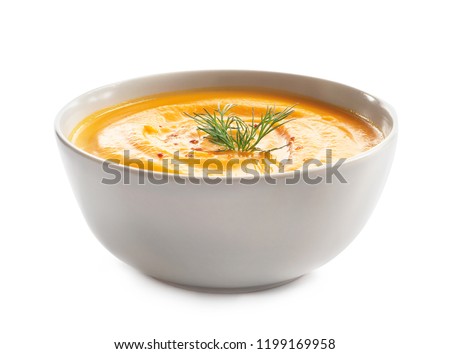 Delicious pumpkin cream soup in bowl on white background ストックフォト © 