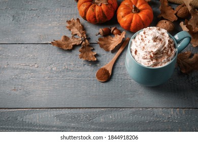 Delicious Pumpkin Latte On Grey Wooden Table, Above View. Space For Text