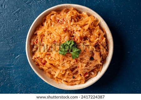 Delicious Quick Pan fried Sauerkraut or Crauti. Finely cut white cabbage cooked. Stewed or braised cabbage. Homemade cabbage stew. Traditional Polish and Lithuanian dishes. Vegetarian food. Top View
