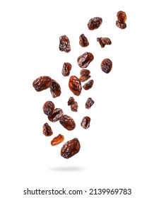Delicious raisins in the air, isolated on a white background