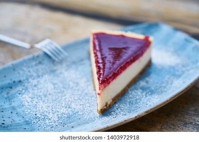 Delicious raspberry cheesecake on the table