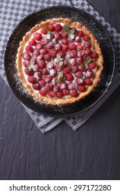 Delicious Raspberry Tart With Whipped Cream On A Plate Vertical View From Above
