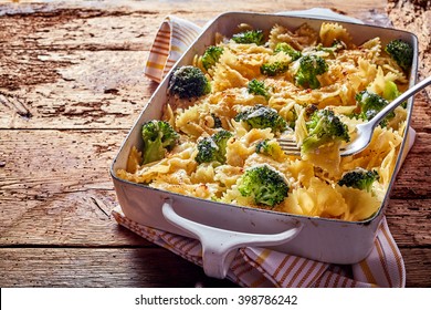 Delicious Recipe With Farfalle, Or Bow Tie, Italian Pasta With Fresh Broccoli Florets In A Cheese Sauce Baked In An Oven Casserole