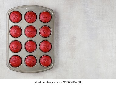 Delicious Red Velvet Cupcakes In Oven Pen. Top View.