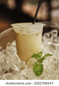 Delicious and refreshing coffee based beverage, ice coffee, cold drink, coffee beans in the cafe