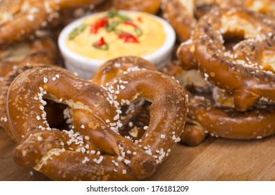 Delicious And Rustic Fresh German Style Pretzel Served With A Cheddar Cheese Spread