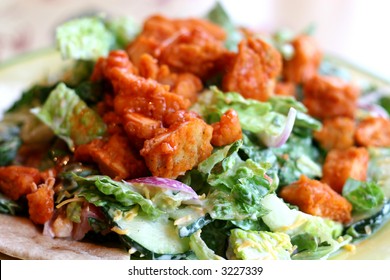 A Delicious Salad With Buffalo Chicken Tenders