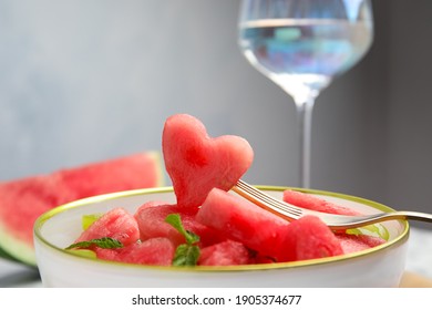 Delicious salad with watermelon in bowl, closeup
