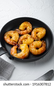 Delicious Sauteed Shrimp With Cajun Seasoning, Curry And Lime Set, On Frying Iron Pan, On White Background