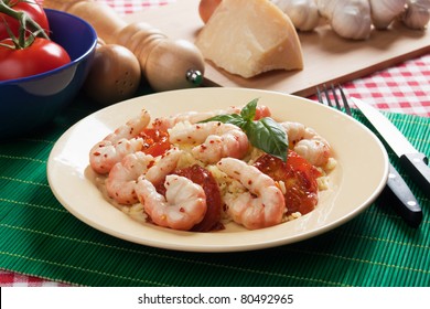 Delicious shrimp prawns served with cooked rice and tomato