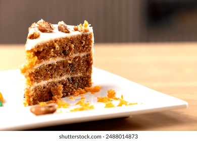 Delicious Slice of Carrot Cake with Cream Cheese Frosting. A mouth-watering close-up of a slice of carrot cake with rich cream cheese frosting. The cake is beautifully layered with moist, carrot - Powered by Shutterstock