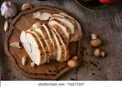 Delicious Sliced Turkey Breast On Wooden Board