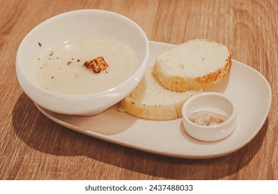 Delicious soup and bread combination.
