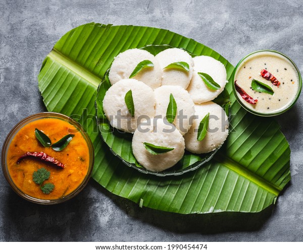 Delicious South Indian dish Idli with Sambar and\
Coconut Chutney