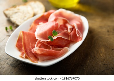 Delicious Spanish Jamon Or Ham On A White Plate