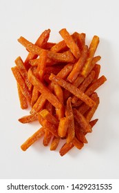 Delicious Speciality Sweet Potato Or Yam Chips Fried And Seasoned Served In A Heaped Portion Isolated On White