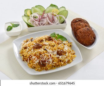 Delicious And Spicy Beef Biryani And Kabab