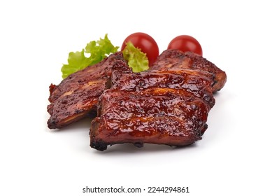 Delicious spicy marinated ribs in a bbq or tomato sauce, isolated on white background