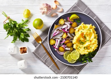 Delicious Sprat Red Onion And Pickles Salad With Hot Potato Mash On A Plate On A Textured Wooden Table, Horizontal View From Above, Flat Lay