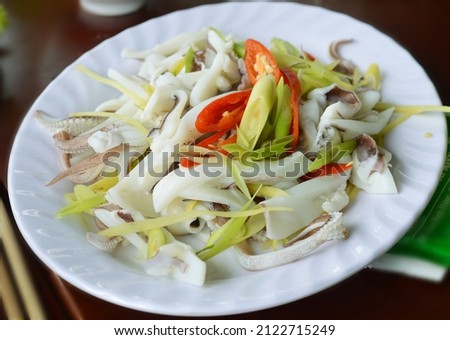 Delicious steamed squid with lemongrass served fresh at a floating restaurant in Binh Hung Island, Vietnam