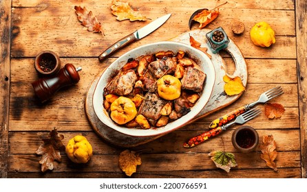 Delicious Stewed Meat With Aromatic Quince In Baking Dish