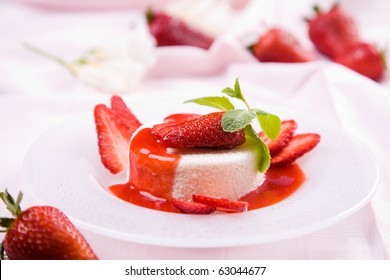 Delicious strawberry dessert with fresh peppermint