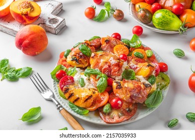 Delicious Summer Warm Salad With Grilled Peaches, Vegetables And Cheese On White Background. Tasty Food