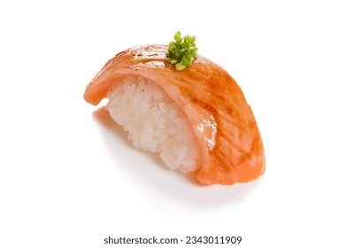 Delicious Sushi Nigiri with smoked Salmon. 
				Seared salmon sushi  with sauce. 
				Isolated on white background.