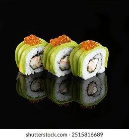 Delicious sushi rolls topped with avocado slices and caviar, perfectly arranged on a reflective black surface. - Powered by Shutterstock