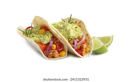 Delicious tacos with guacamole, vegetables and slices of lime isolated on white