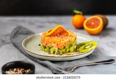 Delicious tartare salmon with kiwi and orange sauce - Powered by Shutterstock