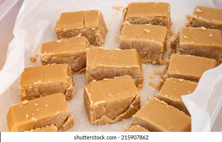 Delicious Tasty Pieces Of Sweet Brown Maple Syrup Fudge Wrapped In Wax Paper