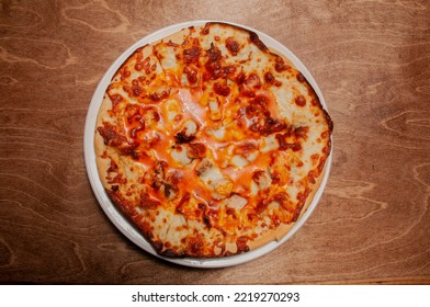 Delicious Tomato Sauce Cheese Covered Hot And Tasty Buffalo Chicken Pizza Pie 