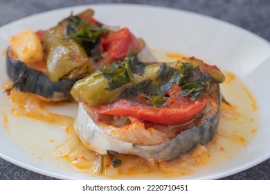 Delicious Traditional Turkish Fish Dish, Palamut Pilaki. Presentation Of A Great Fish Dish On A White Plate. Top Shot.