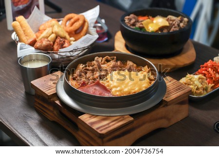 Delicious troop pot, pork with ham and cheese