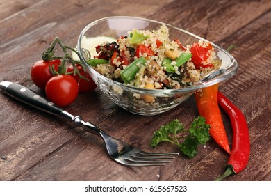 Delicious vegetarian quinoa salad with bell pepper, cucumber