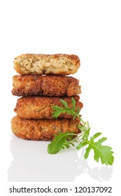 Delicious Veggie Burger Patty Tower With Fresh Arugula Herb Isolated On White Background. Culinary Vegetarian Food.